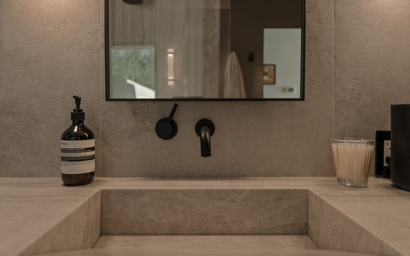 Luxury stone bathroom sink with black fixtures